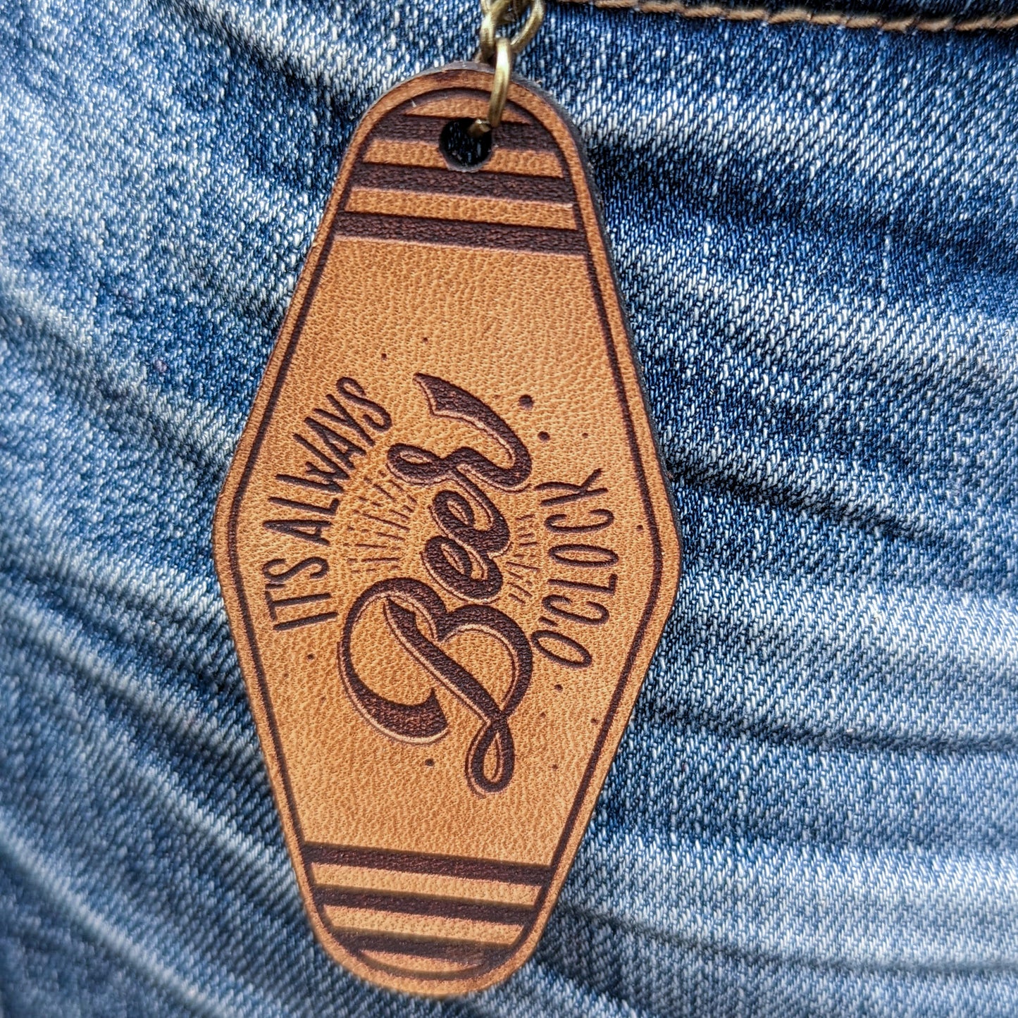 Leather Keychain cut and engraved to look like a vintage motel key with It's always beer o'clock engraved on it.