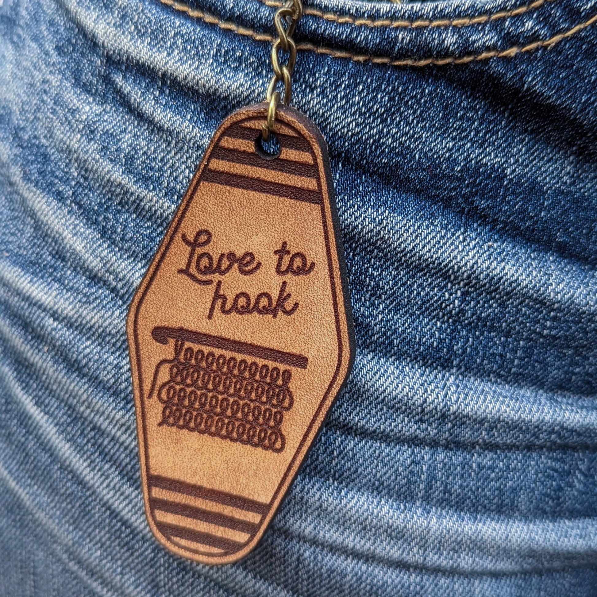 Leather Keychain cut and engraved to look like a vintage motel key with Love to Hook and a crochet illustration engraved on it.