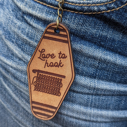 Leather Keychain cut and engraved to look like a vintage motel key with Love to Hook and a crochet illustration engraved on it.